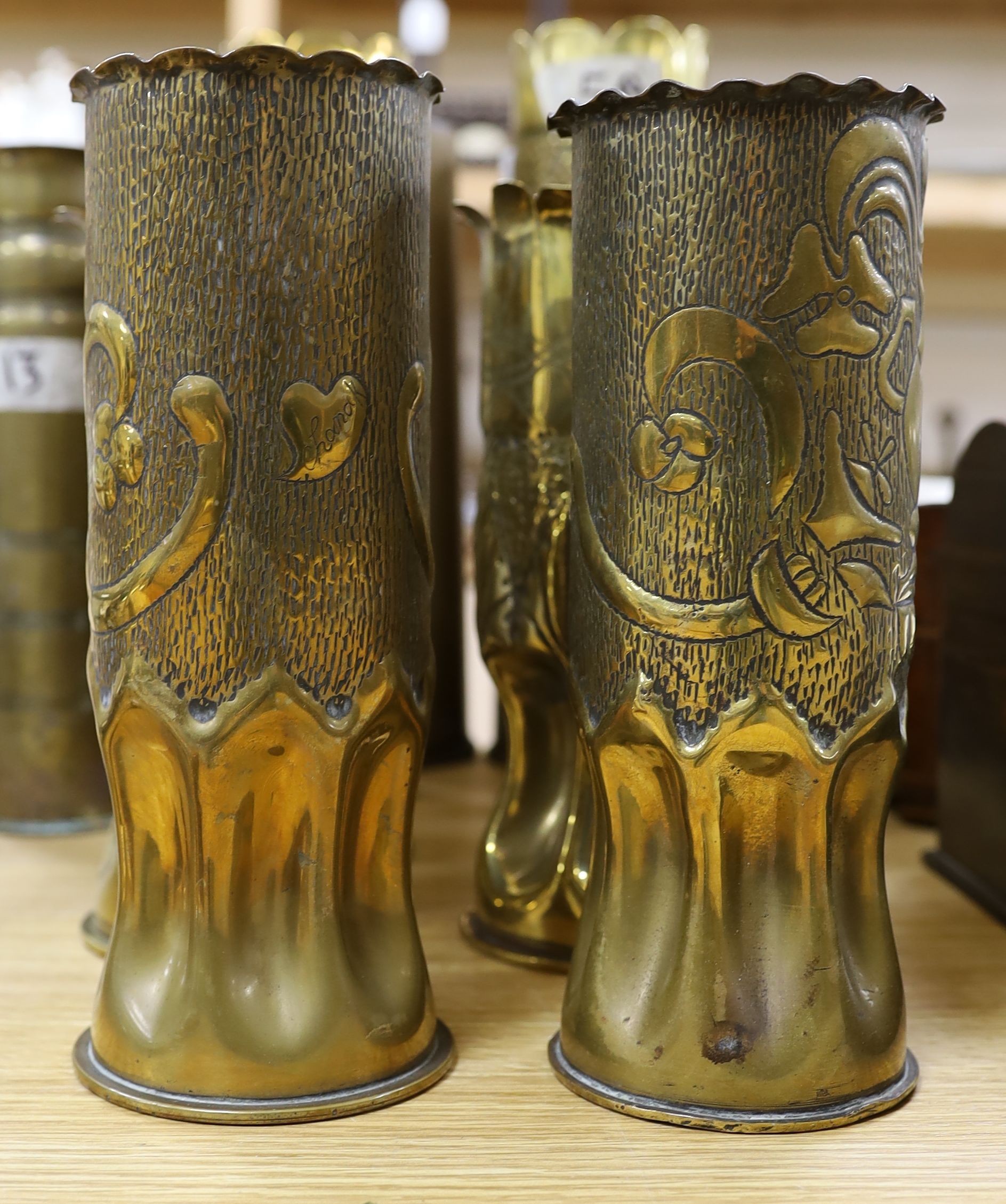 Collection of twelve WW1 trench art shell casings, tallest 31 cms high.